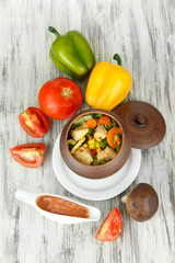 Baked mixed vegetable with chicken breast in pot,