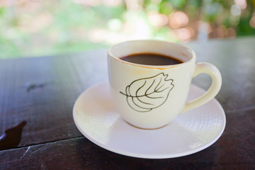 One white cup of aromatic coffee