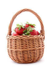 Fototapeta na wymiar wicker basket with strawberries isolated on white