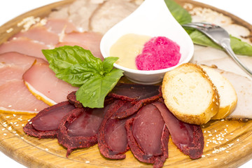 sausage on a wooden plate in a restaurant