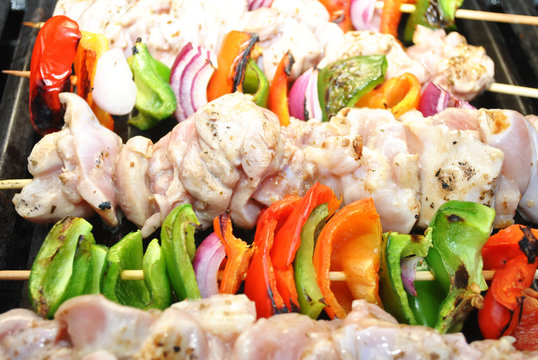 Raw Chicken and Pepper Kabobs on a Hot Grill