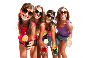 four girls fun with a drink, isolated on white background