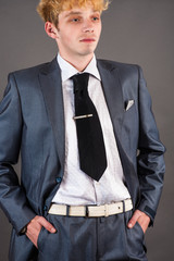 Portrait disdain boss isolated on a gray background