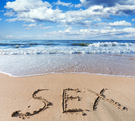 Fototapety  beach with sand word sex