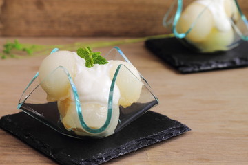 Melon balls with Greek yogurt and mint