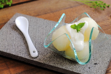 Melon balls with Greek yogurt and mint