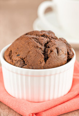 Chocolate muffin with coffe cup