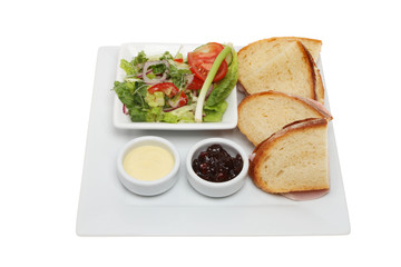 Ham sandwich and salad