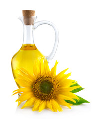 Jug with sunflower oil isolated on white