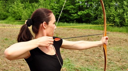 Young women training with the bow