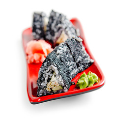 traditional fresh japanese sushi rolls on a white background