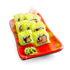 traditional fresh japanese sushi rolls on a white background