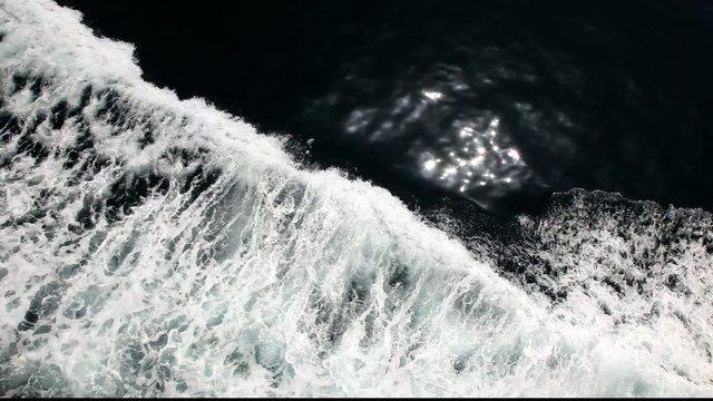 Wave at the bow of a fasts ferry ship