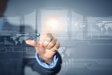 Businessman touching icon