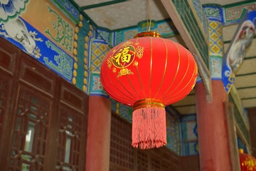 red lanterns with chinese letters printed. It brings good luck a © xiaoliangge