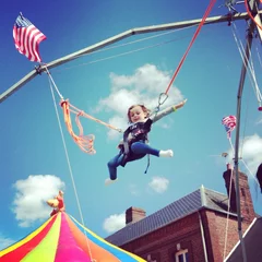 Foto op Canvas child enjoying fancy fair © Morgan