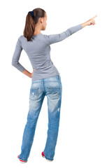 Back view of  pointing woman.