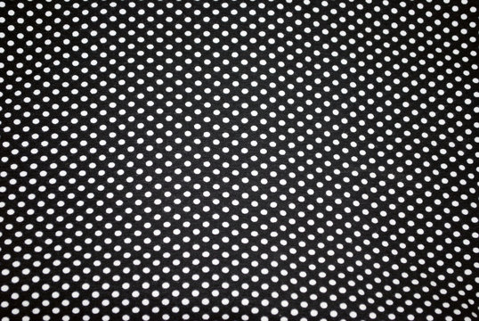 Tiny white polka dots on Navy-blue cloth for backgrounds