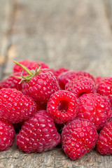 raspberries on wooden surface