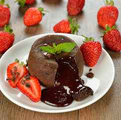 Cake with chocolate and strawberries