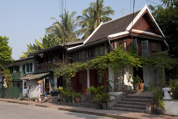 Fototapeta na wymiar Colonial houses of merchants on the street of Luang Prabang.