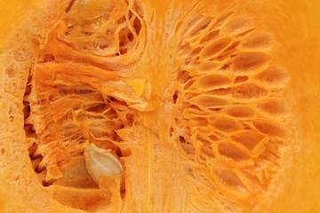 Background of pumpkin slice. Macro.