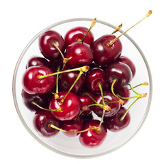 Fresh Cherry in glass bowl isolated on white