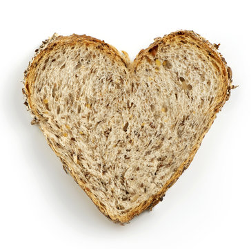 heart shaped slice of brown bread