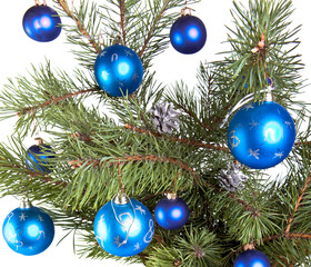 New Year's balls on branches of a Christmas tree