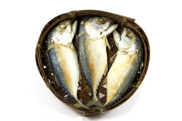 Mackerel fish on the bamboo round basket