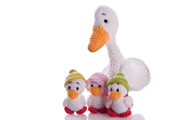 white stuffed animal duck with little chick