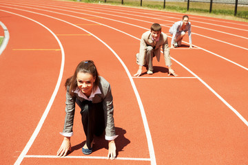 Business woman at athletic stadium