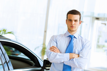 Businessman near car