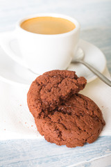 Chocolate cookies and coffee cup