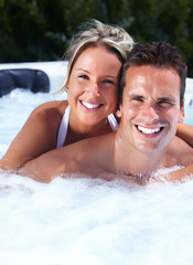 Happy couple in hot tub