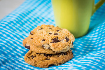Chocolate chips cookies with a drink