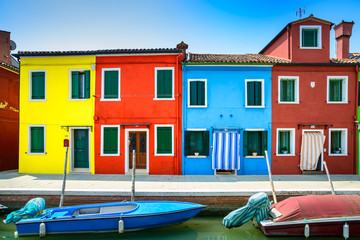 Venice landmark, Burano canal, houses and boats, Italy