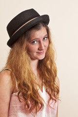 Teen in hat with red hair