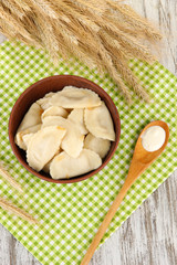 Tasty dumplings with fried onion