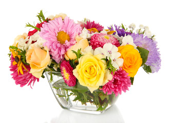 Beautiful bouquet of bright flowers in glass vase, isolated