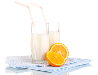 Delicious milk shakes with orange isolated on white