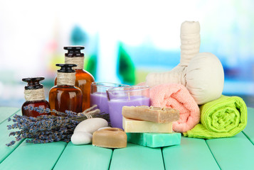 Still life with lavender candle, soap, massage balls, soap and