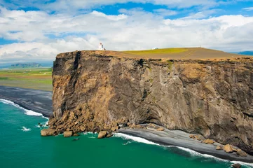 Fotobehang Lighthouse at cape Dyrholaey © Fyle