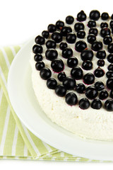 Cheesecake with fresh berries on white plate closeup