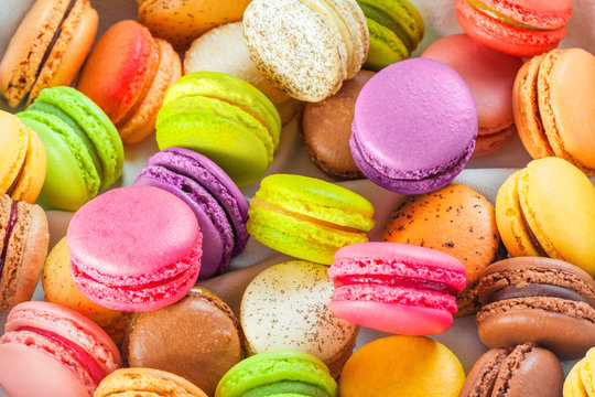 traditional french colorful macarons in a box