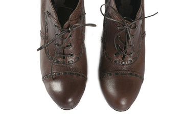 women brown shoes with black laces