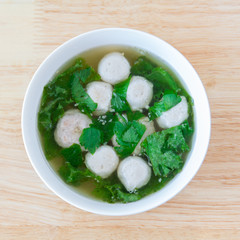 Thai style  soup with meatballs and vegetables