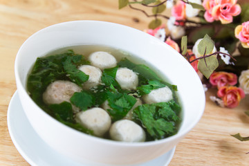 Thai style  soup with meatballs and vegetables