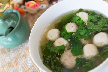 Thai style  soup with meatballs and vegetables