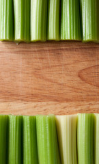 Celery stalks against wood